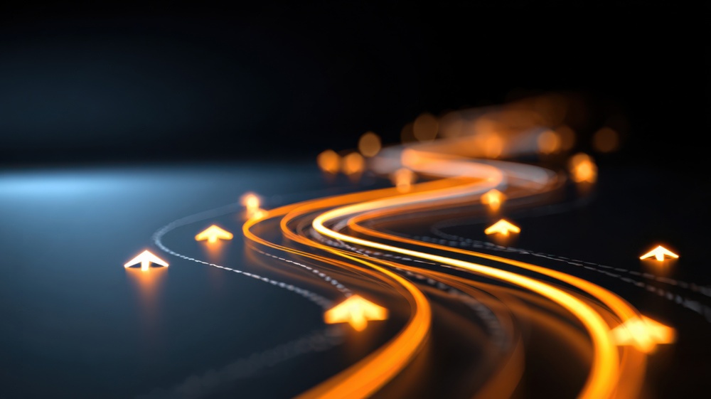 Roadmap-Illustration — ein beleuchteter, geschwungener Weg